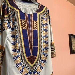 Two pieces clothes. Feel like Satin material. It has beautiful print.